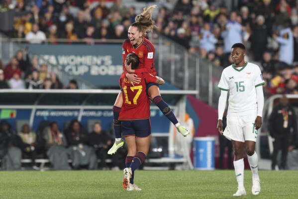 Spain's Alba Redondo, left, and Irene Guerrero celebrate after Redondo scored their fifth goal during the Women's World Cup Group C soccer match between Spain and Zambia in Auckland, New Zealand, Wednesday, July 26, 2023. (AP Photo/Rafaela Pontes)
