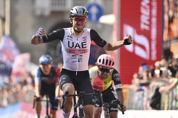 Brandon McNulty celebrates as he wins the 15th stage of the Giro D'Italia, tour of Italy cycling race from Seregno to Bergamo, Italy, Sunday, May 21, 2023. (Massimo Paolone/LaPresse via AP)