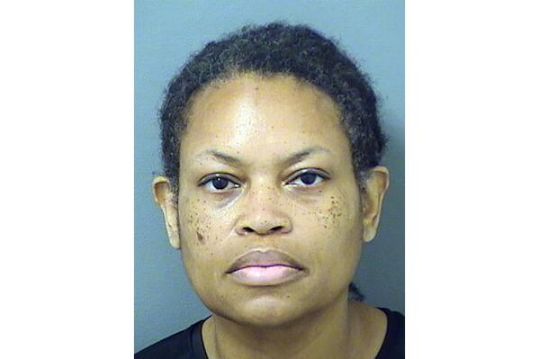 This image provided by the Palm Beach County, Fla., Sheriff’s Office shows Cheryl Ann Leslie, 56, was charged Friday, Nov. 4, 2022, with two counts of felony fraud. The Florida Department of Law Enforcement says Leslie, who is registered as a Democrat, voted in both the 2020 federal and state primary elections in Florida and Alaska. (Palm Beach County Sheriff’s Office via AP)
