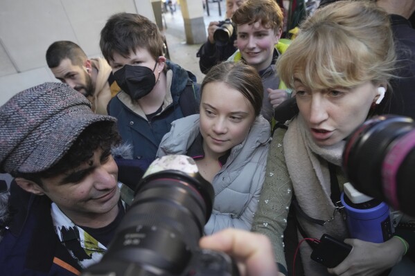 Environmental activist Greta Thunberg arrives at Westminster Magistrates Court, in London, Wednesday, Nov. 15, 2023. Greta Thunberg appeared in court charged over protest in central London. The environmental campaigner was charged with failing to comply with a condition imposed under Section 14 of the Public Order Act after joining the protest outside a London hotel, on October 17. (AP Photo/Kin Cheung)