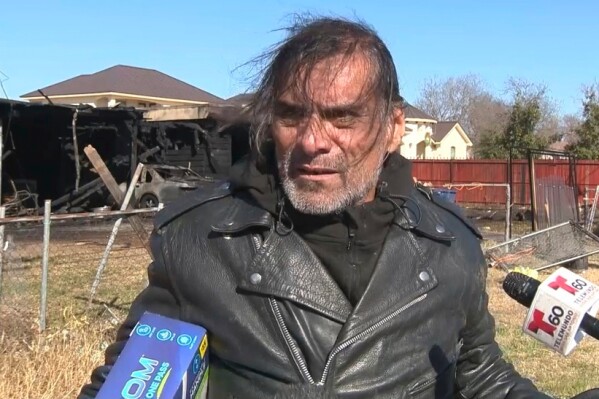 In this image taken from video, Jonathan Joss, an actor best known for his voice work on the animated television series “King of the Hill,” talks to reporters following a fire at his San Antonio, Texas, home on Thursday, Jan. 23, 2025. (KSAT via AP)