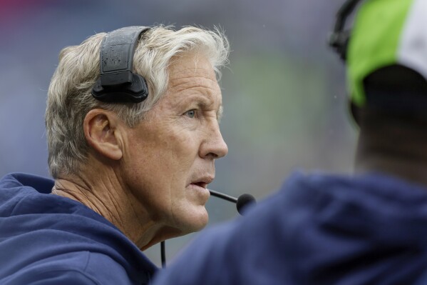 Seattle Seahawks head coach Pete Carroll watches during the second half of an NFL football game against the Carolina Panthers Sunday, Sept. 24, 2023, in Seattle. (AP Photo/John Froschauer)