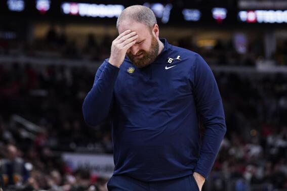 Memphis Grizzlies head coach Taylor Jenkins reacts as he watches his team during the second half of an NBA basketball game against the Chicago Bulls in Chicago, Sunday, April 2, 2023. The Bulls won 128-107. (AP Photo/Nam Y. Huh)