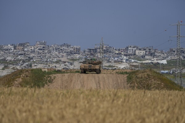 An Israeli tank on its position on the border with the Gaza Strip, in southern Israel, Wednesday, April 3, 2024. (AP Photo/Tsafrir Abayov)