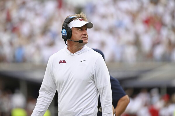 Mississippi head coach Lane Kiffin walks off the field after a time out during the first half of an NCAA college football game against Mercer in Oxford, Miss., Saturday, Sept. 2, 2023. (AP Photo/Thomas Graning)