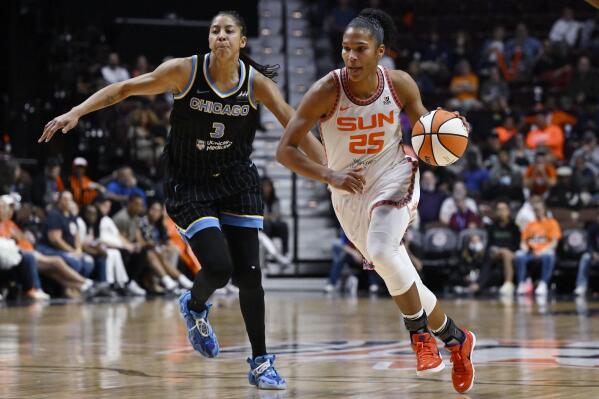 Connecticut Sun forward Alyssa Thomas drives to the basket as Chicago Sky forward Candace Parker defends during the second half of Game 4 of a WNBA basketball playoff semifinal Tuesday, Sept. 6, 2022, in Uncasville, Conn. (AP Photo/Jessica Hill)
