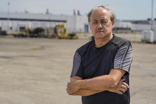 Dave Muffley poses outside one of the Delphi Corporation plants in Kokomo, Ind., Monday, July 11, 2022. As General Motors Corp. underwent the biggest industrial bankruptcy proceedings in history, and the federal government negotiated a company restructuring, Muffley's healthy retirement savings would be slashed by 70 percent, and his life's trajectory would take a dramatic spiral downward. (AP Photo/Michael Conroy)