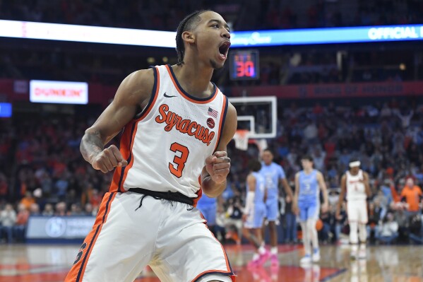 Syracuse guard Judah Mintz (3) reacts during the second half of an NCAA college basketball game against North Carolina in Syracuse, N.Y., Tuesday, Feb. 13, 2024. (AP Photo/Adrian Kraus)