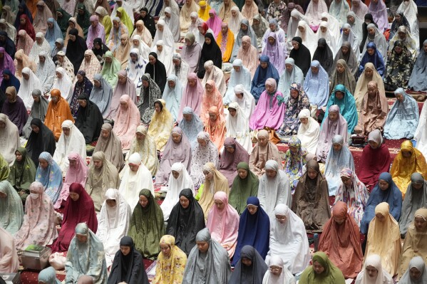 Indonesian Muslims perform an evening prayer called 'tarawih' marking the first eve of the holy fasting month of Ramadan, at Istiqlal Mosque in Jakarta, Indonesia, Wednesday, March 22, 2023. (AP Photo/Achmad Ibrahim)