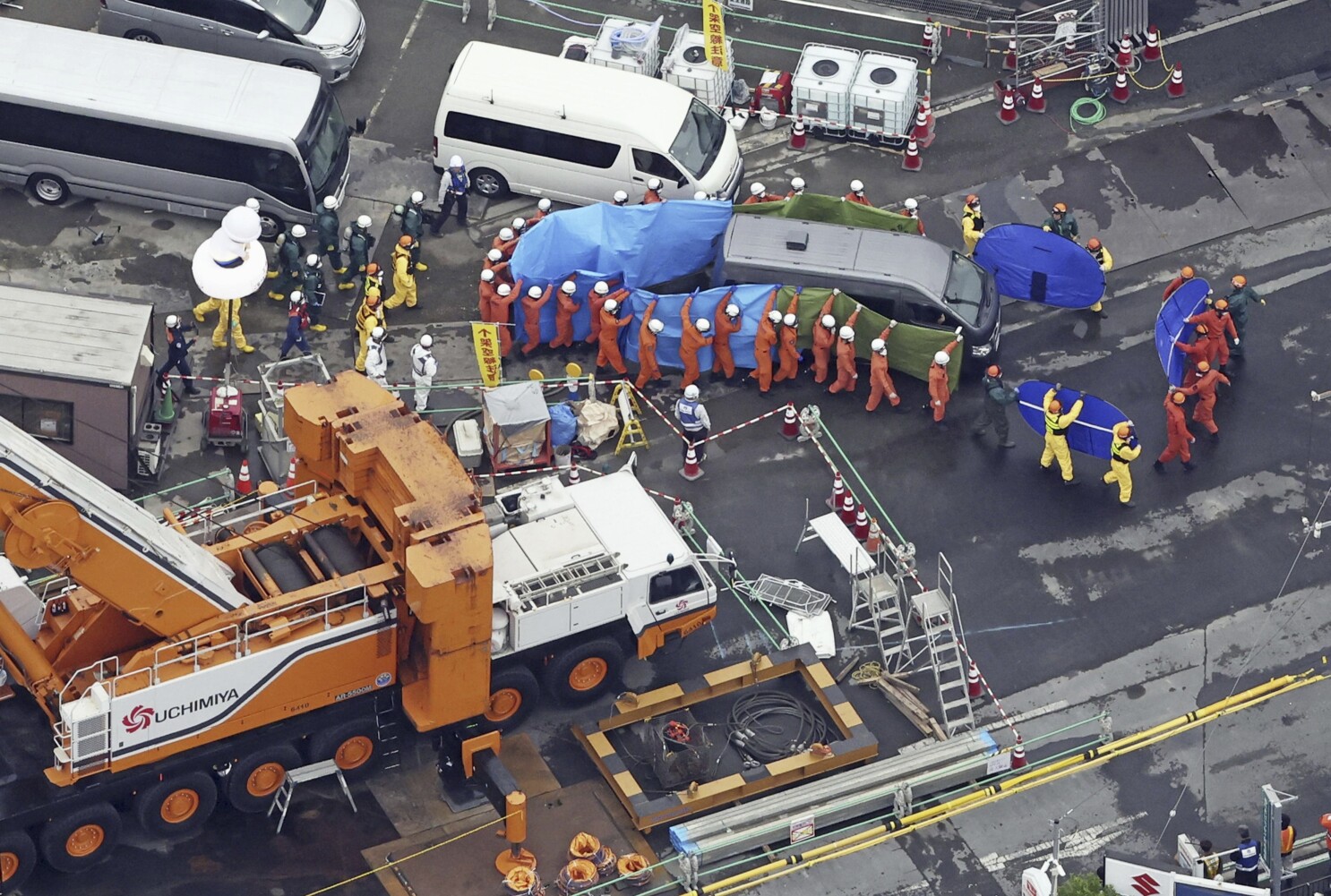 The body of a truck driver whose vehicle fell into a sinkhole in Japan is recovered after 3 months