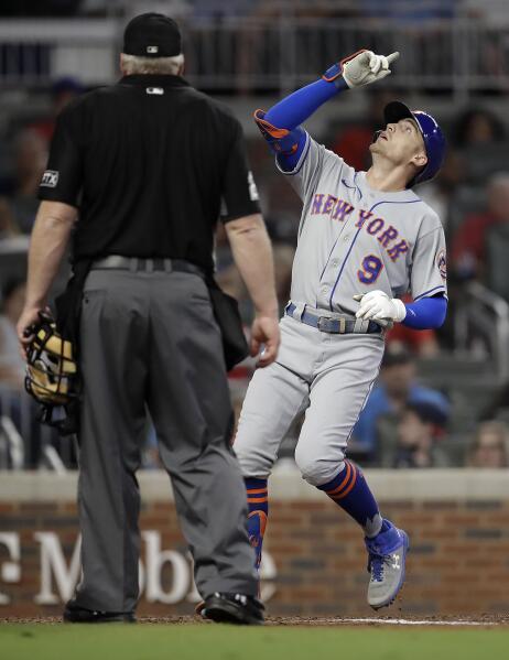 New York Mets' Brandon Nimmo (9) runs to third base for a triple