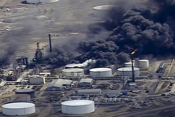 FILE - In this image from video, smoke rises from the Husky Energy oil refinery after an explosion and fire at the plant in Superior, Wis., on April 26, 2018. Officials at the Superior oil refinery knew about equipment issues years before a 2018 explosion, according to Occupational Safety and Health Administration documents obtained by Wisconsin Public Radio. (KSTP-TV via AP, File)