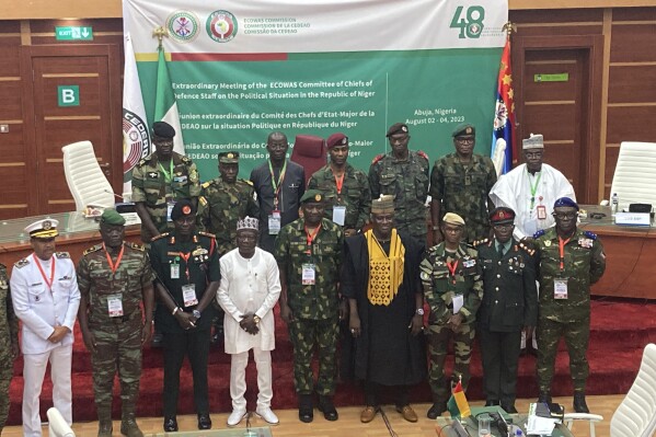 The defense chiefs from the Economic Community of West African States (ECOWAS) countries excluding Mali, Burkina Faso, Chad, Guinea and Niger pose for a group photo during their extraordinary meeting in Abuja, Nigeria, Friday, Aug. 4, 2023, to discuss the situation in Niger. (AP Photo/ Chinedu Asadu)