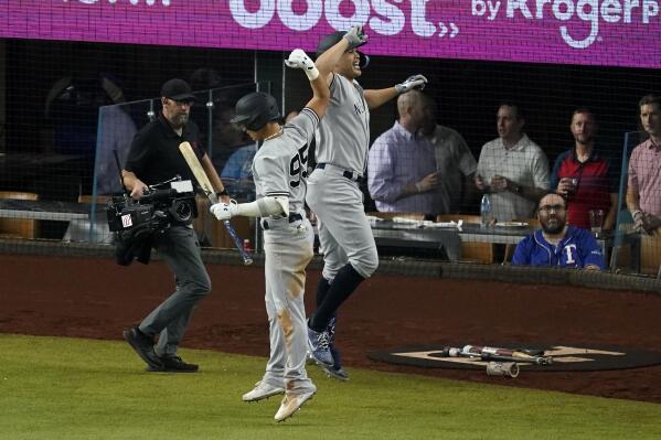 Judge hits 62nd HR, Cole Ks record as Yankees split in Texas