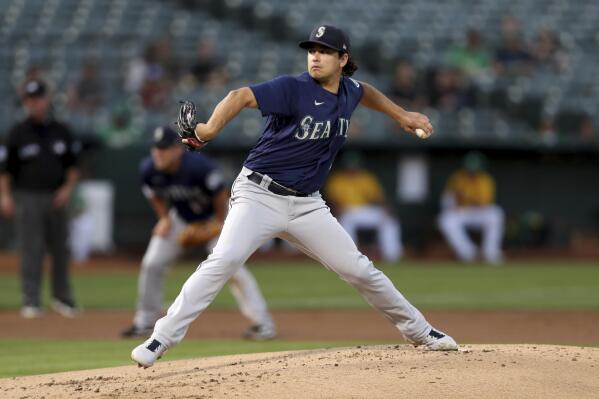 Mariners beat Athletics 5-2 to stay in AL wild-card chase