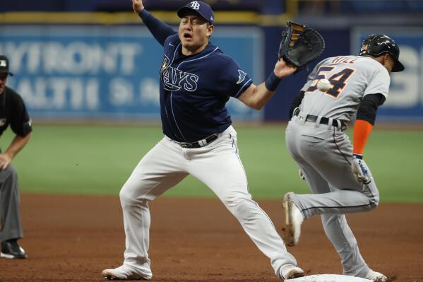 Detroit Tigers' Derek Hill (54) grounds out past Tampa Bay Rays first baseman Ji-Man Choi during the fifth inning of a baseball game Saturday, Sept. 18, 2021, in St. Petersburg, Fla. (AP Photo/Scott Audette)