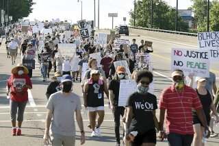 Thousands participated in a Black Lives Matter march through Alcoa and Maryville, Tenn., Sunday June 7, 2020. The course of the march led attendees from the Martin Luther King Jr. Community Center to the Blount County Courthouse inn Blount County . (Scott Keller/The Daily Times via AP)