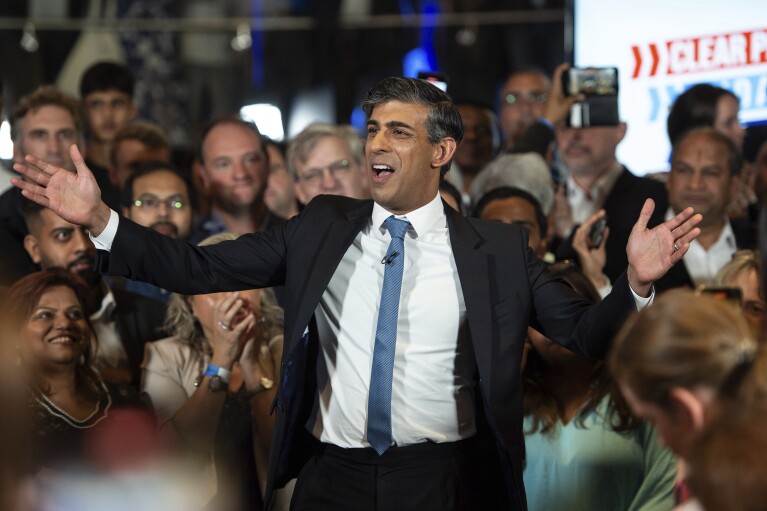 Britain's Prime Minister and Conservative Party leader, Rishi Sunak, delivers a speech at a Conservative Party campaign event at the National Army Museum in London., Tuesday, July 2, 2024. (AP Photo/Thomas Krych)