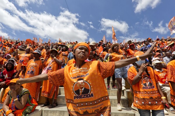 Ruling party supporters of President, Andry Rajoelina, attend an election rally in Antananarivo, Sunday Nov. 12, 2023. Madagascar's Andry Rajoelina is pushing ahead with a presidential election, Thursday, Nov. 16, that could give him a third term, even as opposition protests roil the country and the majority of candidates have announced a boycott. (AP Photo/Alexander Joe)