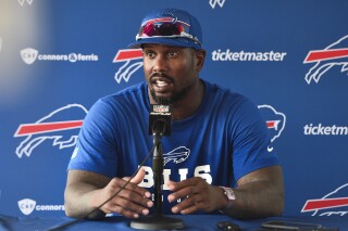 FILE - Buffalo Bills linebacker Von Miller speaks during a news conference after practice at the NFL football team's training camp in Pittsford, N.Y., Wednesday, July 26, 2023. Bills edge rusher Von Miller is scheduled to resume practicing on Wednesday, and isn't ruling out the possibility of making his season debut in Buffalo's "home" game against Jacksonville in London on Sunday. (AP Photo/Adrian Kraus, File)