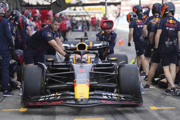 Red Bull driver Max Verstappen of the Netherlands gets pushed back into his garage after the third practice ahead of the Japanese Formula One Grand Prix at the Suzuka Circuit, Suzuka, central Japan, Saturday, Sept. 23, 2023. (AP Photo/Toru Hanai)