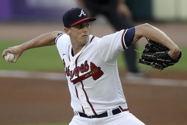 Atlanta Braves pitcher Kyle Wright works against the Miami Marlins during the first inning of a baseball game Friday, April 22, 2022, in Atlanta. (AP Photo/Ben Margot)