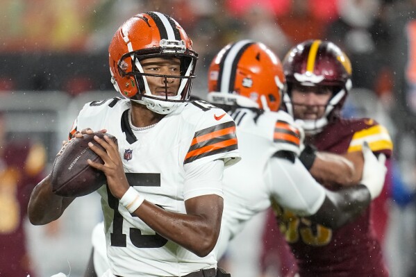 Cleveland Browns quarterback Joshua Dobbs looks to pass during the first half of a preseason NFL football game against the Washington Commanders on Friday, Aug. 11, 2023, in Cleveland. (AP Photo/Sue Ogrocki)
