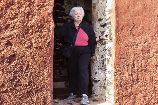 FILE - U.S. Treasury Secretary Janet Yellen stands in the "Door Of No Return" on Goree Island, Senegal, Saturday Jan. 21, 2023. The Chinese government said Tuesday, Jan. 25, 2023, that the United States should stop pressuring it on debt relief for Zambia and get its own financial house in order to avert a default and possible repercussions for the global economy. (AP Photo/Stefan Kleinowitz, File)