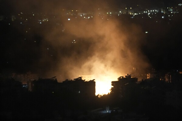 Israel sends army division into southwestern Lebanon - as senior Hezbollah commander 'killed in Beirut'