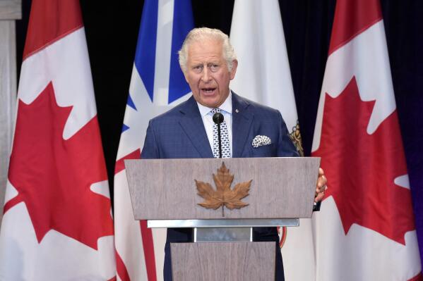 Prince Charles speaks during a welcoming ceremony upon his arrival in St. John's, as he and Camilla, Duchess of Cornwall, begin a three-day Canadian tour, Tuesday, May 17, 2022.  (Paul Chiasson/The Canadian Press via AP)