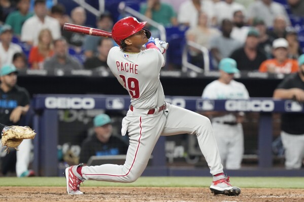 Pache's pinch-hit, 2-run HR rallies Phils past Marlins for record-tying  13th straight road win