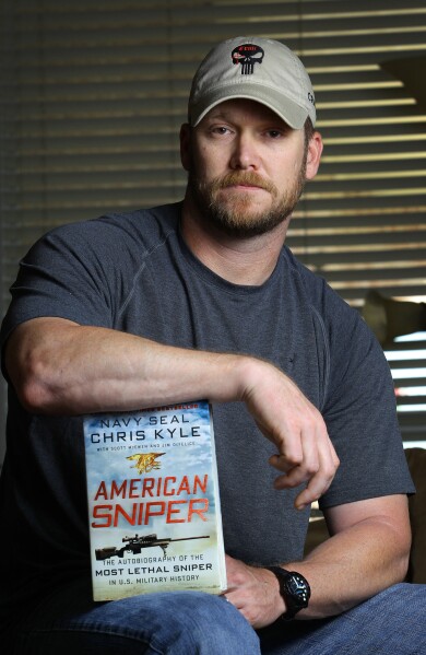 In this April 6, 2012, photo, former Navy SEAL and author of the book American Sniper poses in Midlothian, Texas. A Texas sheriff has told local newspapers that Kyle has been fatally shot along with another man on a gun range, Saturday, Feb. 2, 2013. (AP Photo/The Fort Worth Star-Telegram, Paul Moseley)  