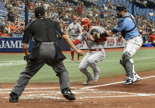 A line drive hit by Los Angeles Angels' Taylor Ward sails over the glove of  Tampa Bay Rays left fielder Randy Arozarena for a double during the third  inning of a baseball