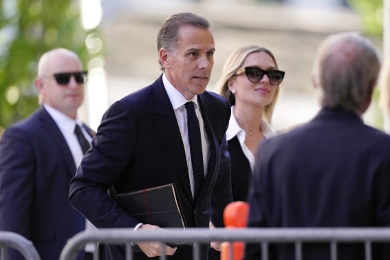 Hunter Biden arrives to federal court with his wife, Melissa Cohen Biden, Monday, June 10, 2024, in Wilmington, Del. (AP Photo/Matt Slocum)