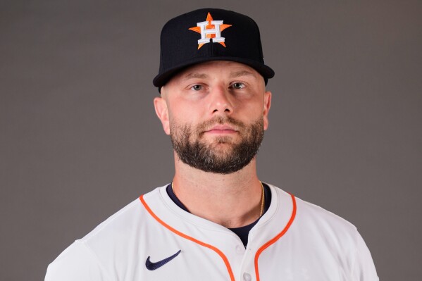 Astros first baseman Christian Walker's MRI shows no sign of strain in his  oblique | AP News