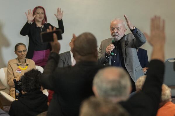 Brazil's former President Luiz Inacio Lula da Silva, who is running for president again, meets with leaders of evangelical churches in Sao Paulo, Brazil, Wednesday, Oct. 19, 2022. Brazil's presidential runoff election is on Oct. 30. (AP Photo/Andre Penner)