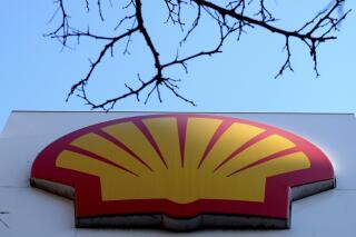 FILE - This Wednesday, Jan. 20, 2016 file photo shows the Shell logo at a petrol station in London. On Friday, Feb. 12, 2021, Energy giant Shell said Tuesday, March 8, 2022 that it will stop buying Russian oil and natural gas and shut down its service stations, aviation fuels and other operations in the country amid international pressure for companies to sever ties over the invasion of Ukraine. (AP Photo/Kirsty Wigglesworth, File)