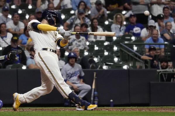 Victor Caratini's two-run single in 11th lifts Brewers over Dodgers