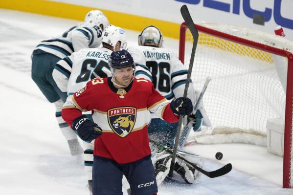 Florida Panthers center Sam Reinhart (13) celebrates after scoring during the second period of an NHL hockey game against the San Jose Sharks, Thursday, Feb. 9, 2023, in Sunrise, Fla. (AP Photo/Wilfredo Lee)