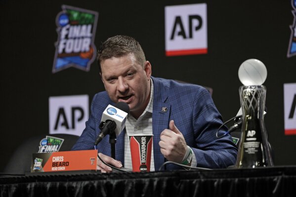 
              Texas Tech basketball coach Chris Beard speaks during a news conference after being named The Associated Press College Basketball Coach of the Year Thursday, April 4, 2019, in Minneapolis. (AP Photo/David J. Phillip)
            