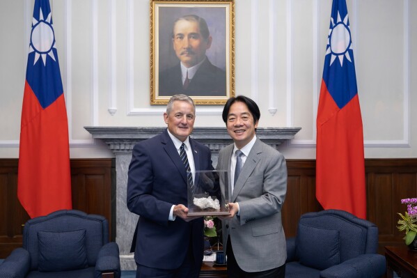 In this photo released by the Taiwan Presidential Office, Taiwan's President William Lai Ching-te, right, meets with Rep. Bruce Westerman, chair of the House Natural Resources Committee in Taipei, Taiwan on Tuesday, May 27, 2025 (Taiwan Presidential Office via AP)