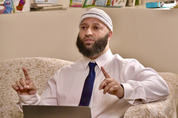 Adnan Syed answers a question following a press conference at his family's home, Sept. 19, 2023, in Windsor Mill, Md. Arguments are set to begin Thursday, Oct. 5, 2023, in Maryland's Supreme Court over Syed's appeal of a reinstatement of his murder conviction by the state's intermediate appellate court. (Amy Davis/The Baltimore Sun via AP, file)