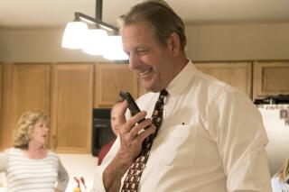 FILE - In this April 4, 2017, file photo, North Las Vegas Mayor John Lee takes a call about election results in Las Vegas. Lee announced Monday, May 17, 2021, he's running for governor next year, challenging incumbent Democrat Steve Sisolak. Lee switched his political affiliation last month from Democrat to Republican, citing a shift toward socialism in the Democratic Party. (Heidi Fang/Las Vegas Review-Journal via AP, File)