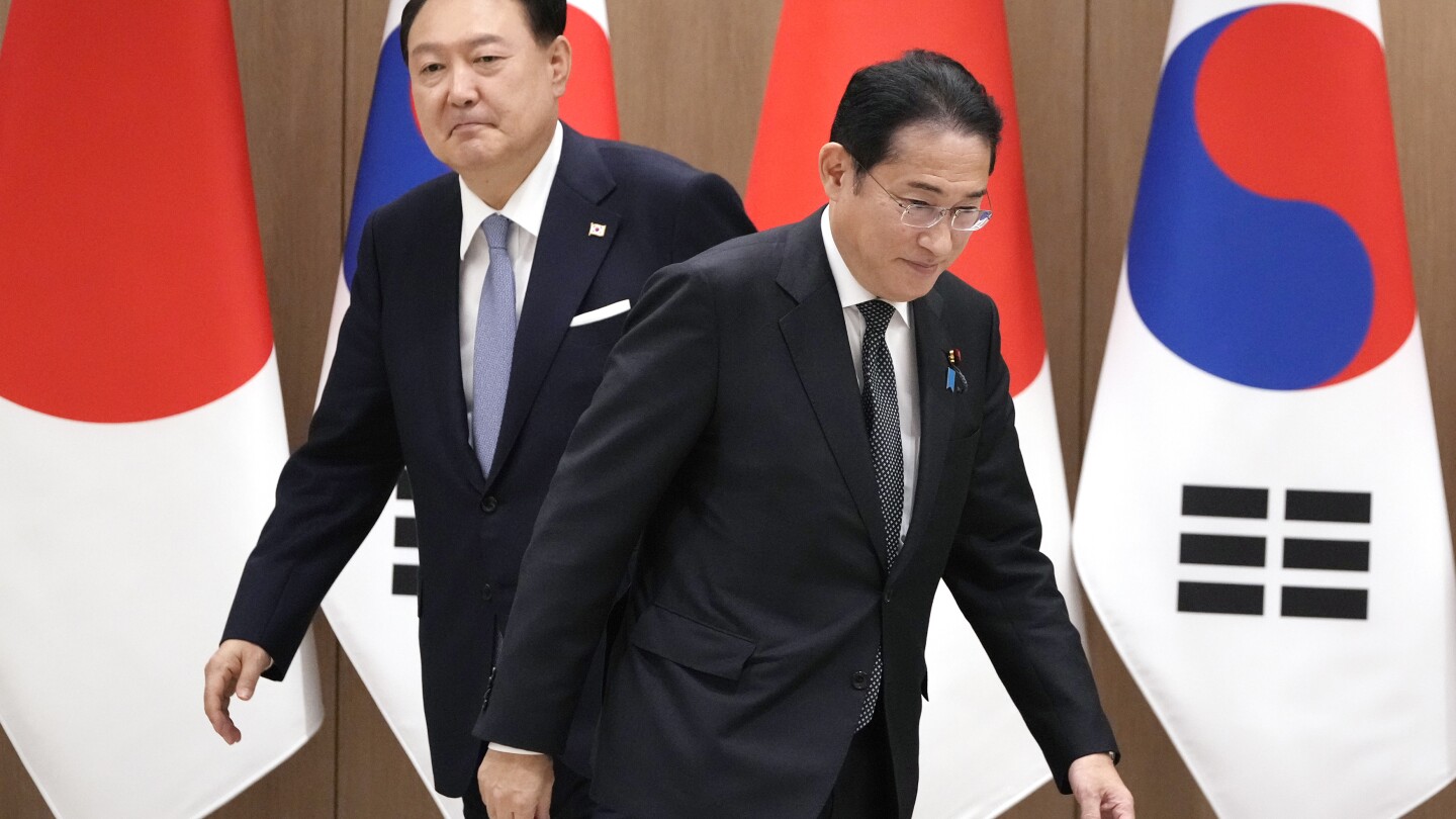 Japan’s leader makes a farewell visit to Seoul and reaffirms sympathy for Korean colonial victims