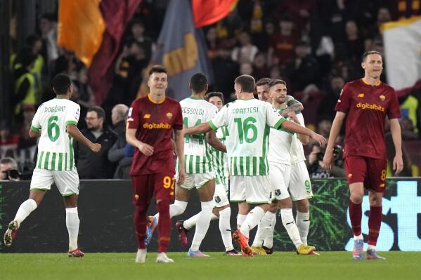 Roma's Stephan El Shaarawy, left, and Roma's Nemanja Matic, react after Sassuolo's Domenico Berardi scores his side's 3rd goal during a Serie A soccer match between Roma and Sassuolo, at Rome's Olympic stadium, Sunday, March 12, 2023. (AP Photo/Alessandra Tarantino)