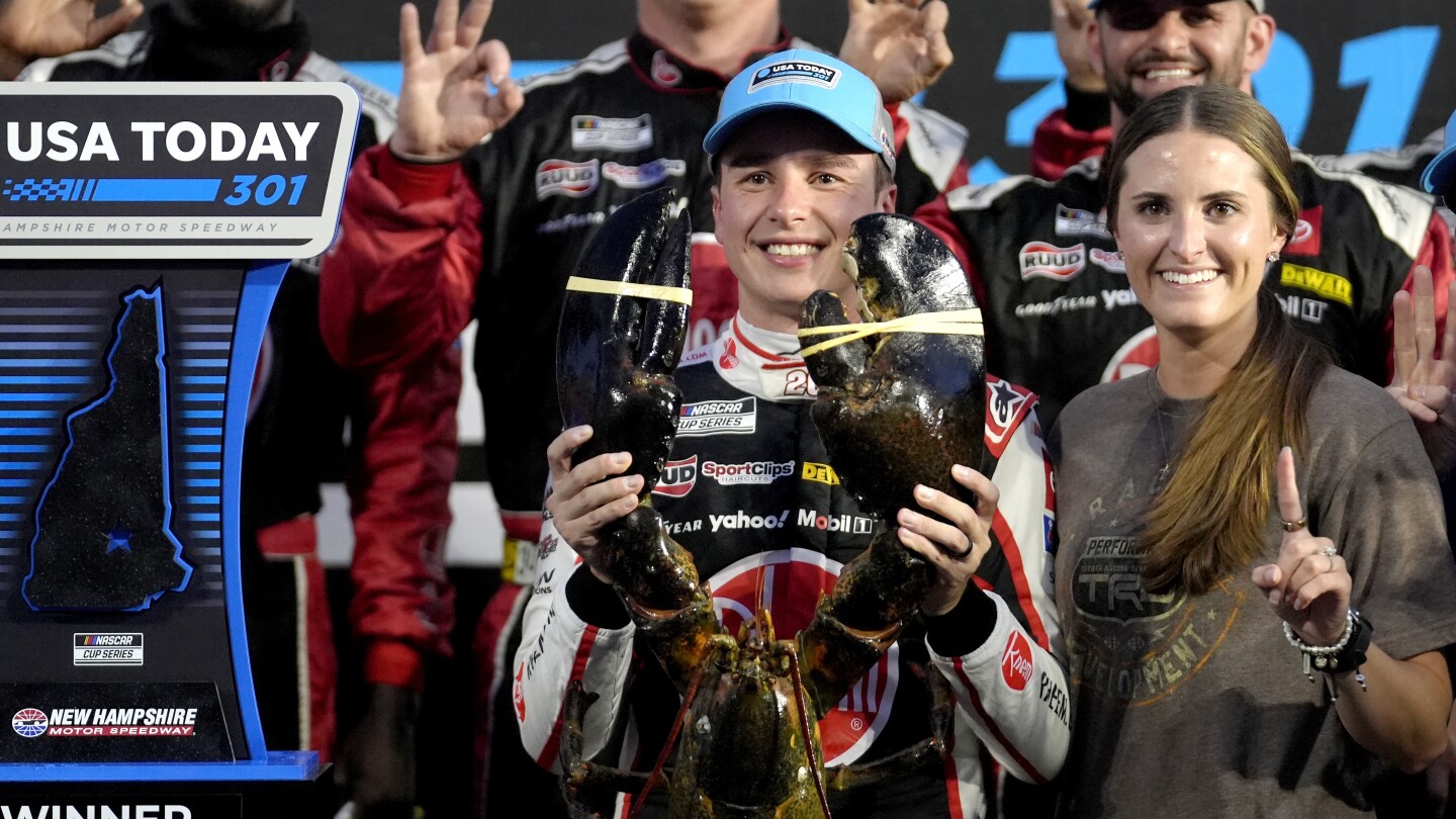Christopher Bell takes the checkered flag on rain tires at the NASCAR Cup race in New Hampshire