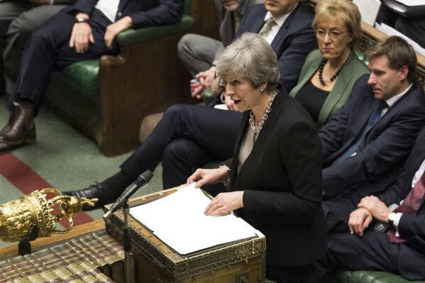 
              Britain's Prime Minister Theresa May reacts as she addresses the house of Commons Parliament during the debate on Britain's Brexit European Union Withdrawal Act, in London, Tuesday Jan. 29, 2019.  Seeking to break the parliamentary deadlock on Britain's Brexit from Europe, Theresa May says she plans to seek a change on the divorce deal between Europe and the U.K. (Jessica Taylor/UK Parliament via AP)
            