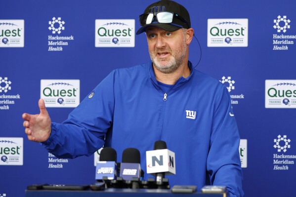 New York Giants defensive coordinator Shane Bowen talks to reporters before NFL football practice in East Rutherford, N.J., Thursday, June 5, 2025. (AP Photo/Noah K. Murray)