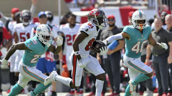 Miami allows 558 yards to Brady and Bucs in 45-17 loss