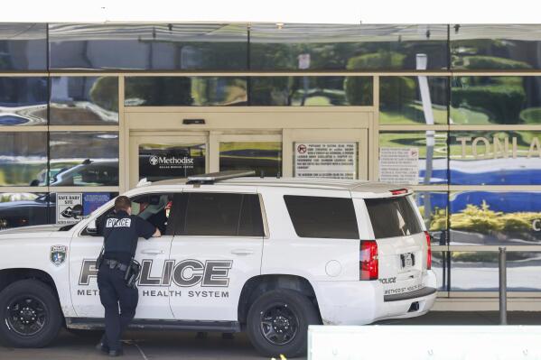 Police respond to an active shooter incident at Methodist Dallas Medical Center on Saturday, Oct. 22, 2022. Two hospital employees were shot during the incident, according to police. (Liesbeth Powers/The Dallas Morning News via AP)